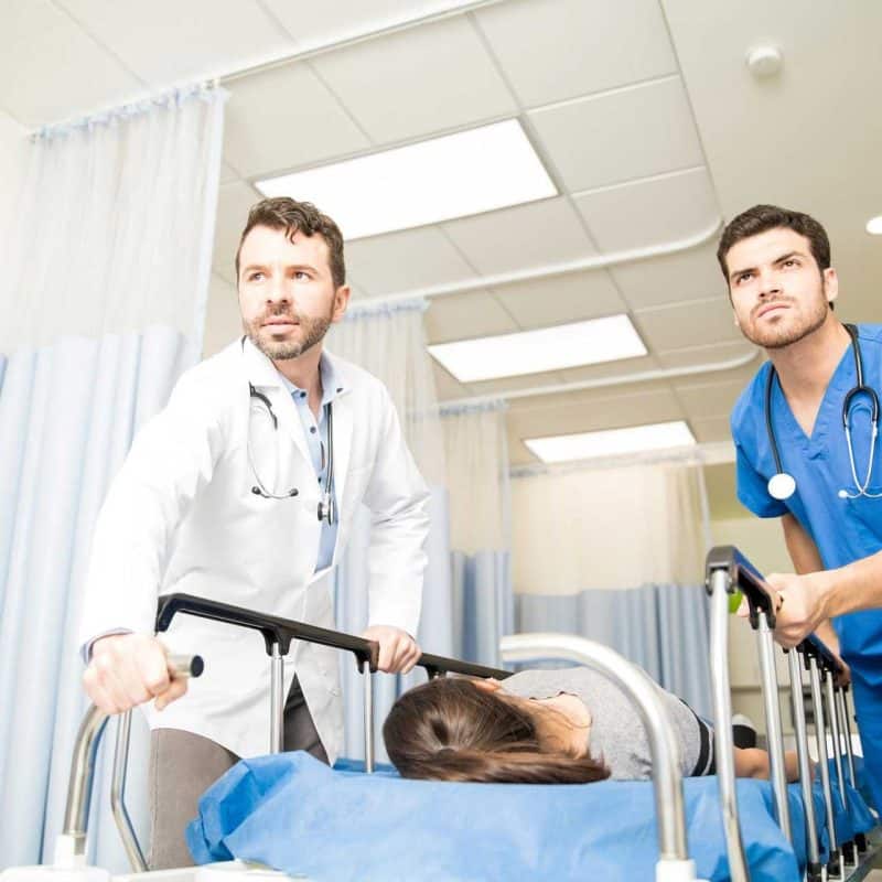 Patient receiving emergent care after a motor vehicle collision