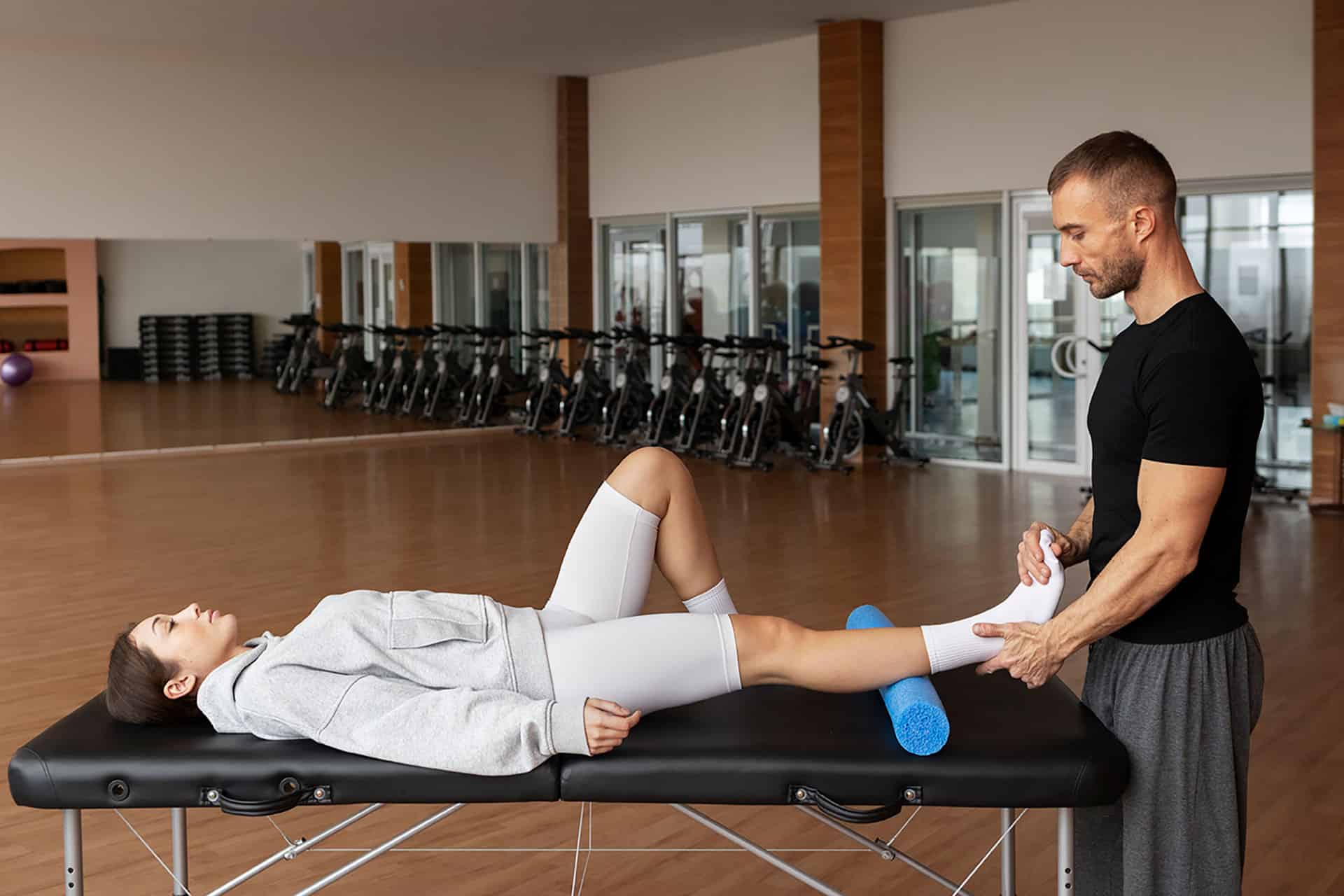 Physical therapist assisting patient with rehabilitation exercises at Eatontown Elite Care Center in Monmouth County, NJ